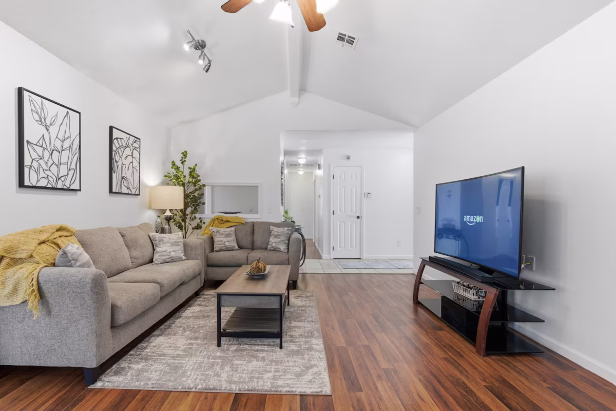 Tulsa Airbnb management by White Lilly Properties — living room of a managed Tulsa short-term rental